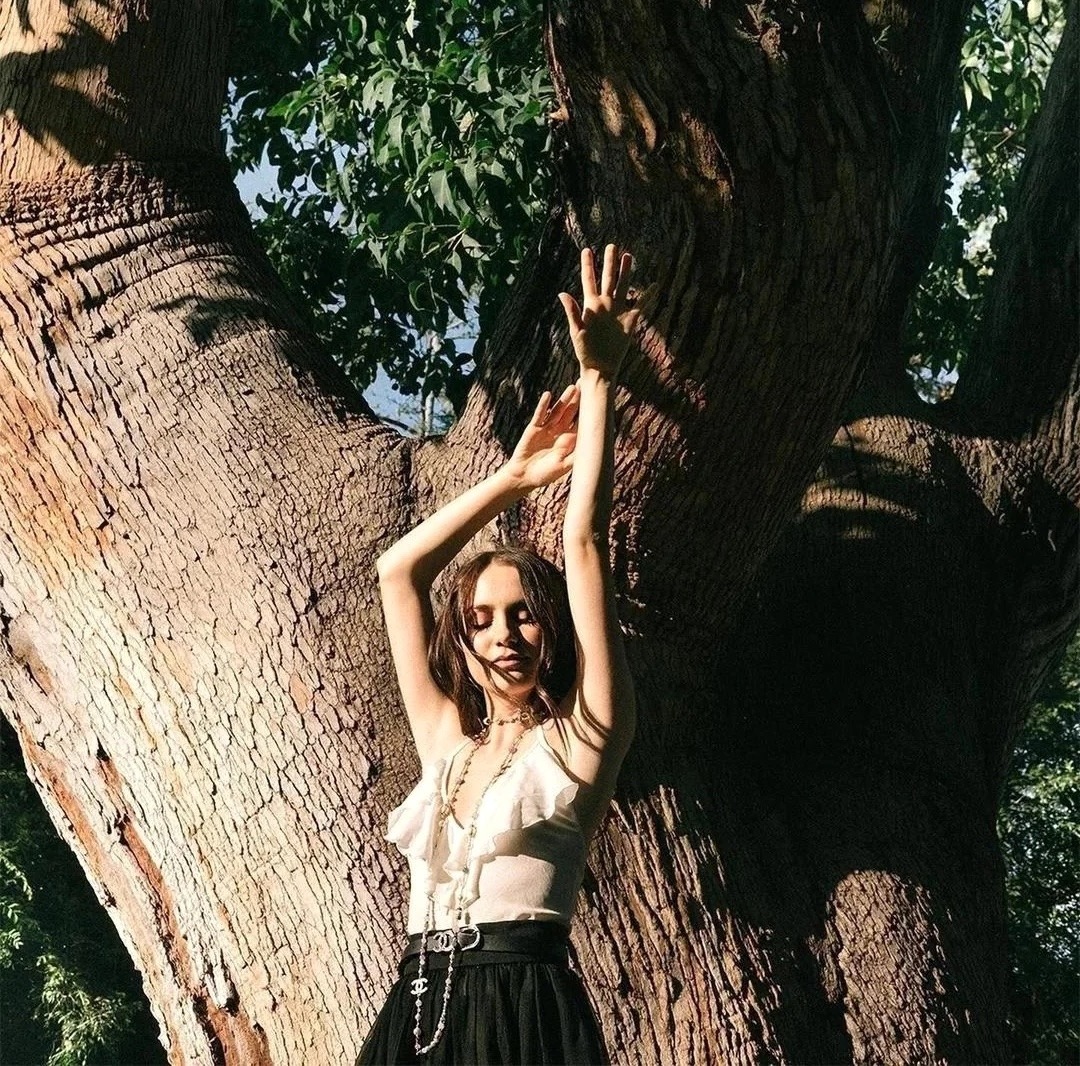 Woman by Tree