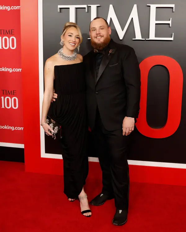 Nicole Combs and Luke posing on the red carpet at the 2026 TIME100 Gala.
