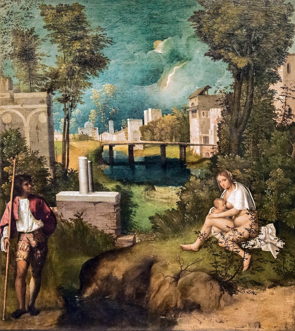 Renaissance painting showing two figures in a landscape with a bridge, buildings, trees, and stormy sky