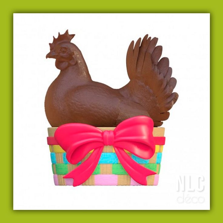 Chocolate rooster in a pastel basket with a pink bow on a white background