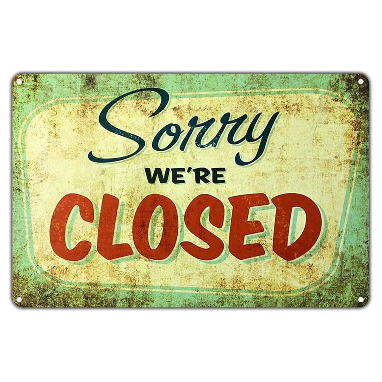 Rusty vintage metal sign saying Sorry We're Closed with distressed green and cream background