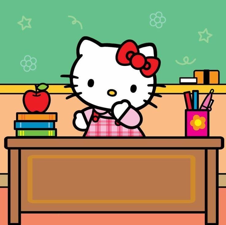 Hello Kitty cartoon behind a desk with books, apple, and pencils