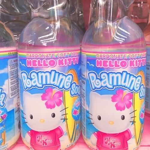 Hello Kitty branded ramune soda bottles with pink bow graphics and colorful Japanese labels