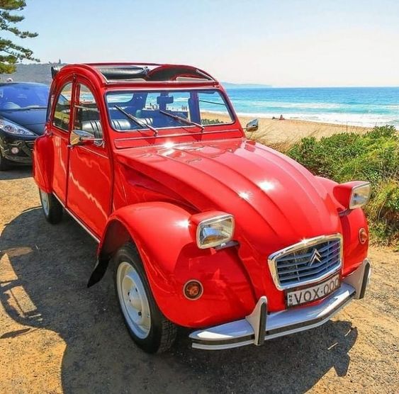 Red Vintage Car at Beach