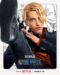 Blonde character in dark suit from One Piece Netflix series holding phone