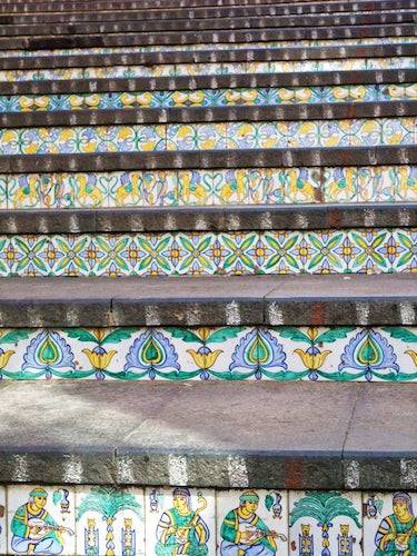 Decorative ceramic tile staircase with colorful hand-painted patterns in Caltagirone, Sicily