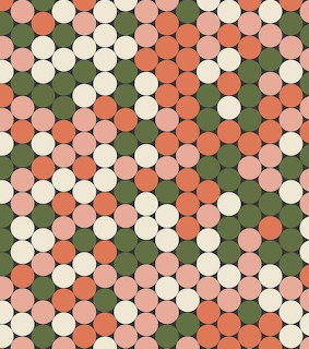 Geometric pattern of circles in coral, pink, cream, and olive green on a dark green background