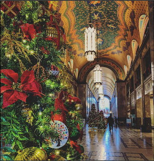 Christmas decorations in the ornate interior corridor of the Detroit Fisher Building