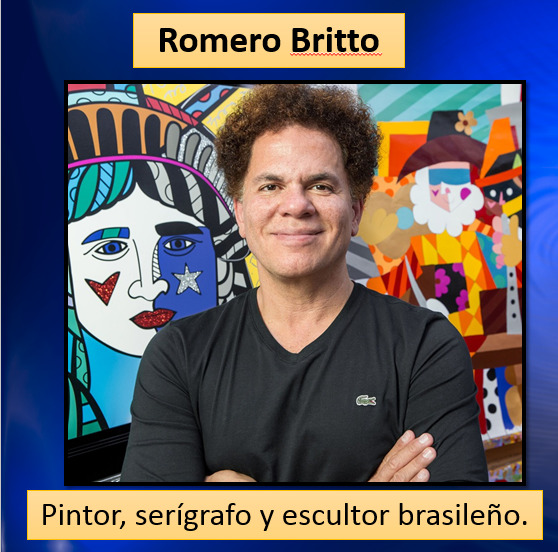 Romero Britto smiling in front of his colorful pop art paintings with bold geometric patterns