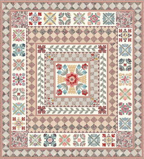 Vintage patchwork quilt with multiple decorative borders and folk art patterns in red, blue, and tan