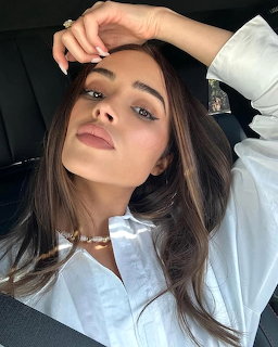 Woman in White Shirt