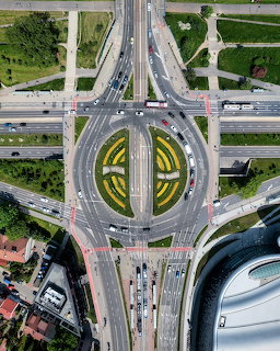Aerial view of Rondo Mogilskie roundabout in Krakow with tram tracks and roads