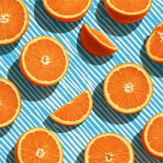 Orange Slices on Striped Background