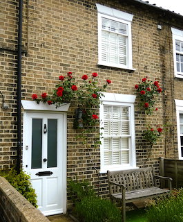 Brick Cottage with Roses