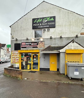 Hot Shots Pizza and Fast Food restaurant exterior with yellow shopfront and signage
