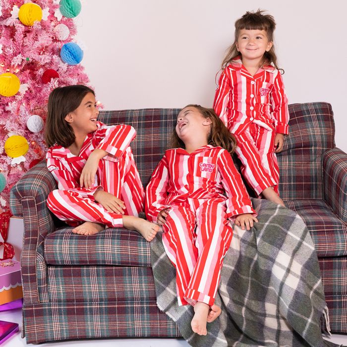 Children in Striped Christmas Pajamas