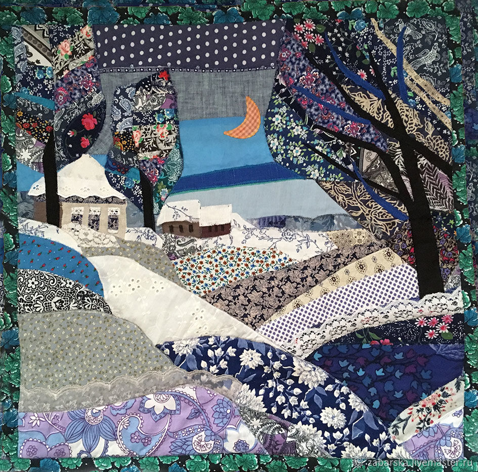 Textile patchwork art showing winter village with cottage, trees, moon and snowy landscape in mixed fabric patterns