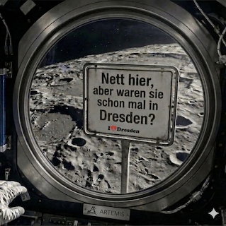 Lunar surface seen through round spacecraft window with German text sign in foreground