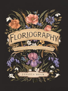 Floriography book cover with ornate floral illustration and decorative banner on dark background
