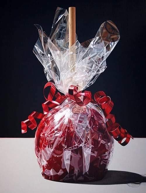 Photorealistic painting of a red candy apple wrapped in clear cellophane tied with red curly ribbons