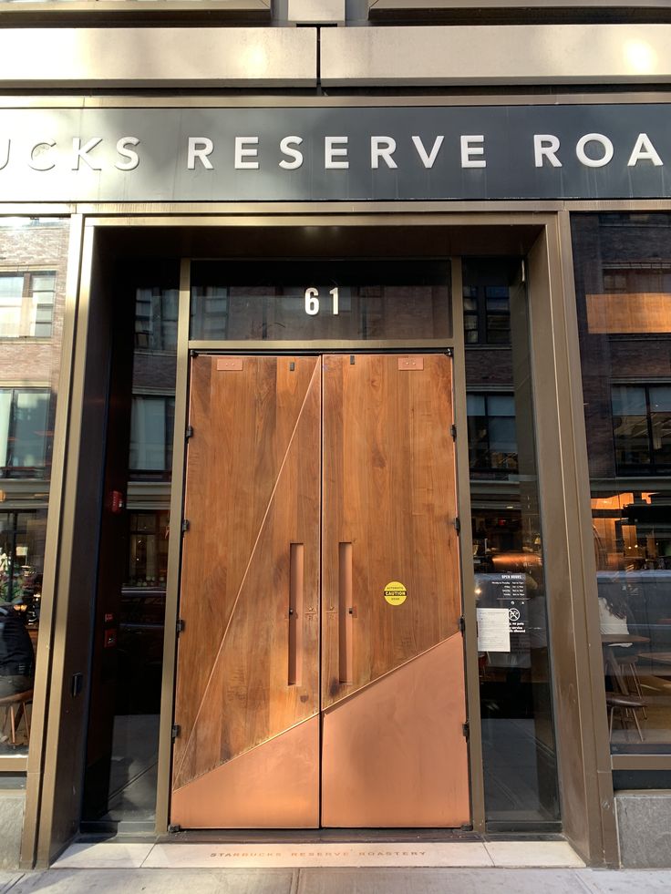 Interior of Starbucks Reserve Roastery cafe with coffee bar and industrial decor