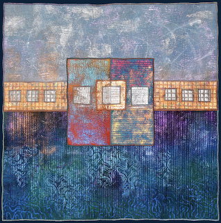 Abstract textile collage with layered fabric squares, decorative borders, and blue textured background