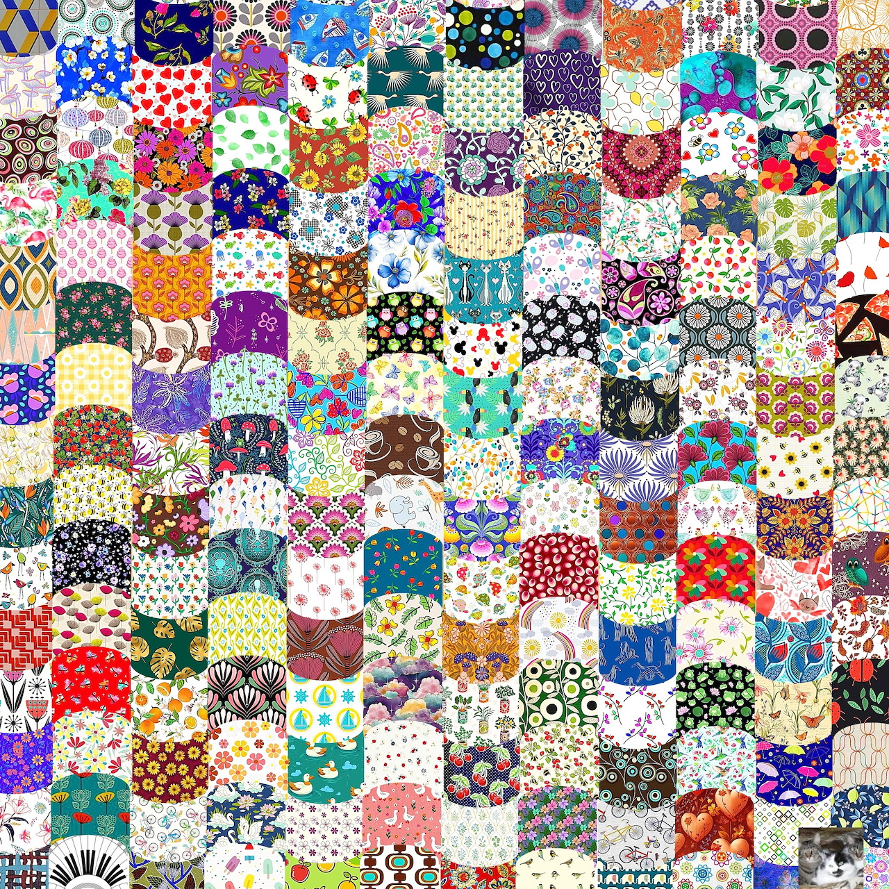 Colorful patchwork quilt grid with hundreds of small squares showing varied floral and geometric patterns