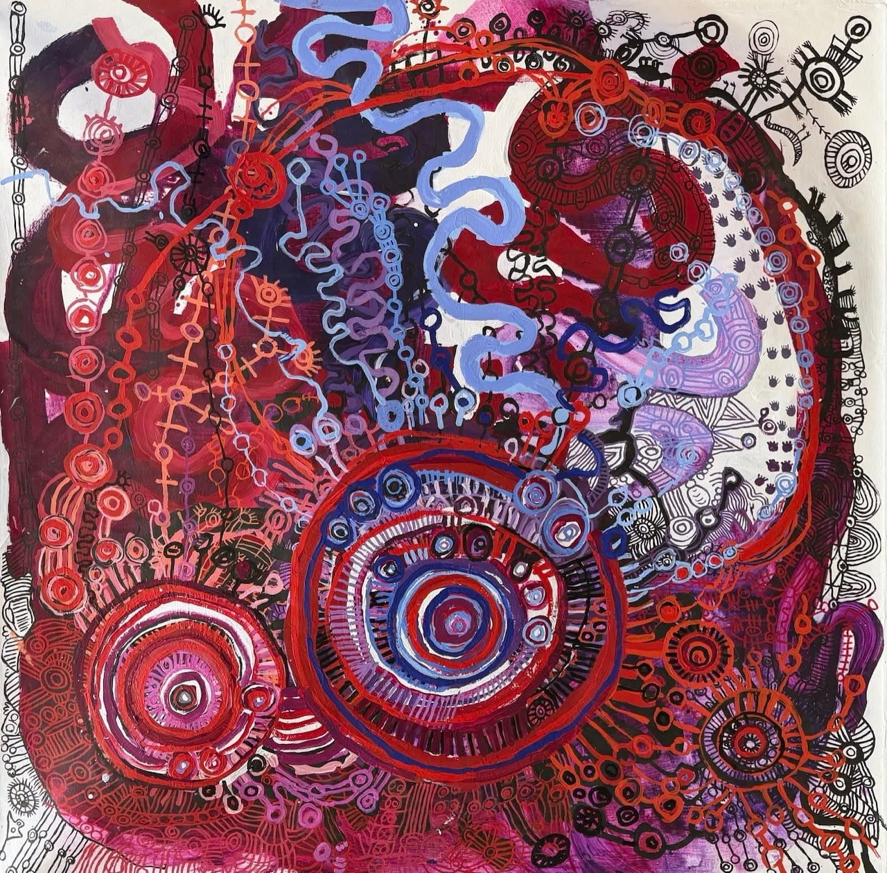 Abstract art with red, blue, and purple swirling patterns and circular mandala-like designs on textured background