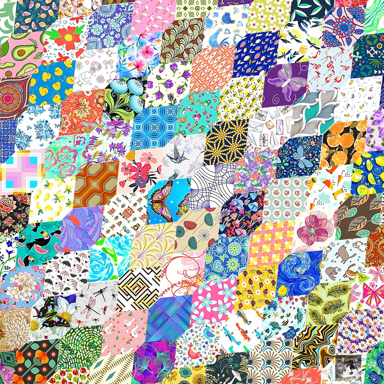Colorful patchwork quilt with diverse patterns including florals, dots, geometric designs, and various fabric textures