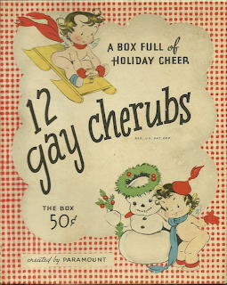Vintage holiday box illustration showing cherubs, a snowman, and festive lettering