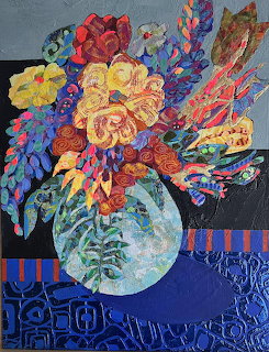 Vibrant painting of mixed flowers in ornate vase on patterned blue surface