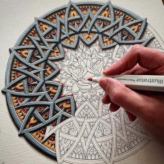 Hand coloring an intricate circular mandala with a marker