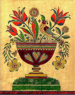 Pennsylvania Dutch folk art with ornate vase, flowers, and birds in red, yellow, and green on aged paper