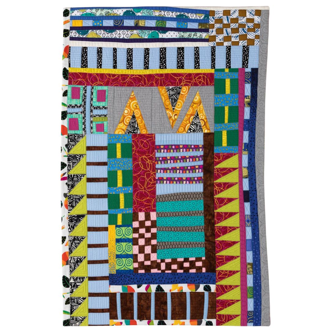 Colorful abstract quilt-like patchwork with geometric patterns and stripes