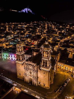 Aerial night view of Zacatecas Cathedral lit up in the historic city center
