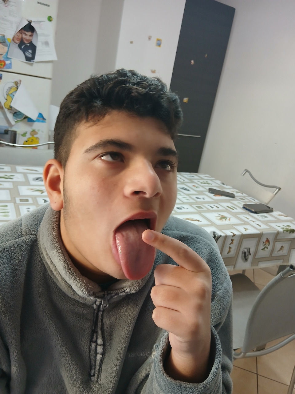 Boy Sticking Out Tongue