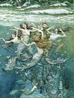 Mermaids Dancing Underwater
