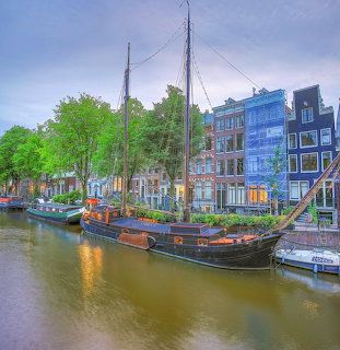 Amsterdam Canal with Historic Ship