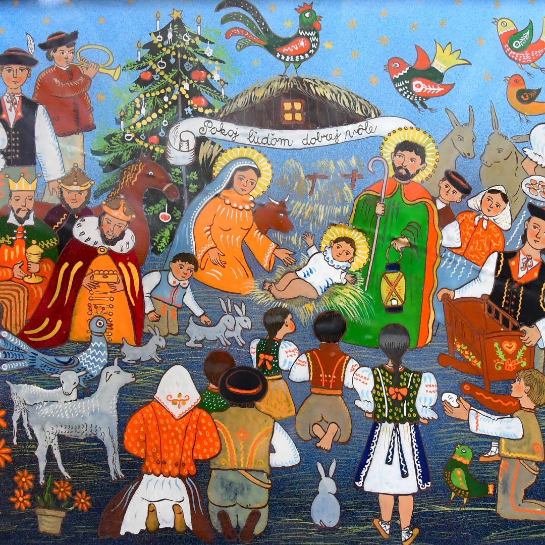 Colorful folk art Nativity scene with Mary, Joseph, baby Jesus, angels, animals, and visitors