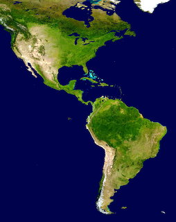 Satellite map of the Americas with North and South America surrounded by dark blue ocean