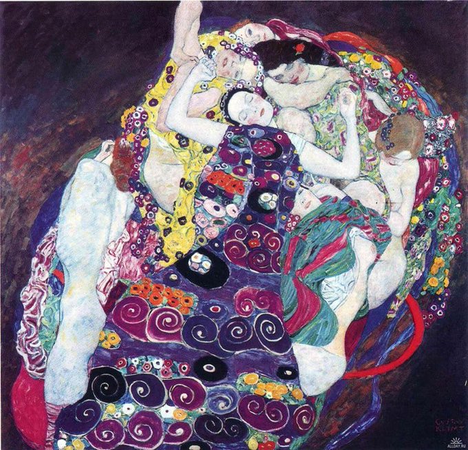 Klimt painting of woman in decorative swirling patterns with gold and vibrant colors