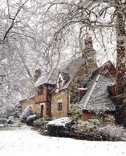 Cottage-style house with detailed architecture in an outdoor setting