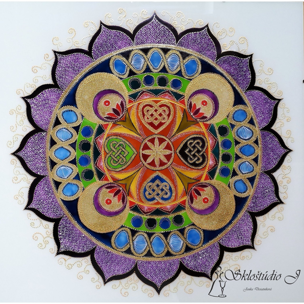 Colorful mandala with layered geometric patterns, heart shapes, and purple petals on light background
