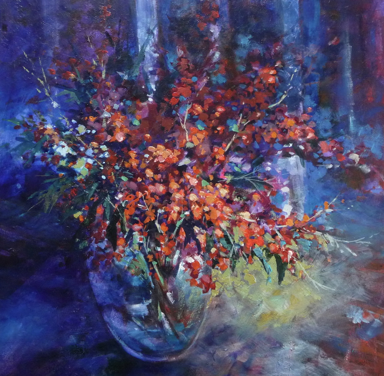 Abstract floral painting of a colorful bouquet in a glass vase against a deep blue background