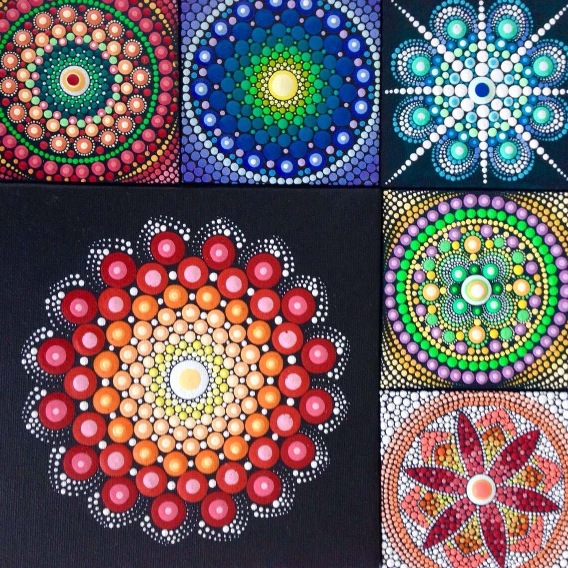 Collage of six colorful pebble mandala patterns arranged in a square grid