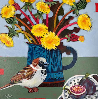 Sparrow next to blue vase of yellow dandelions and pomegranate on table