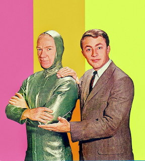 Two men from My Favorite Martian TV show posing against colorful striped background
