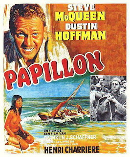 Papillon 1973 film poster with Steve McQueen, Dustin Hoffman, beach scene and prison imagery