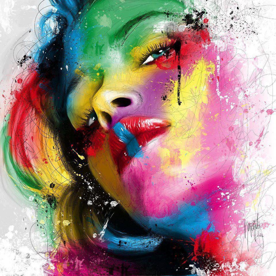 Abstract portrait of woman with colorful paint splashes in rainbow hues covering face and hair