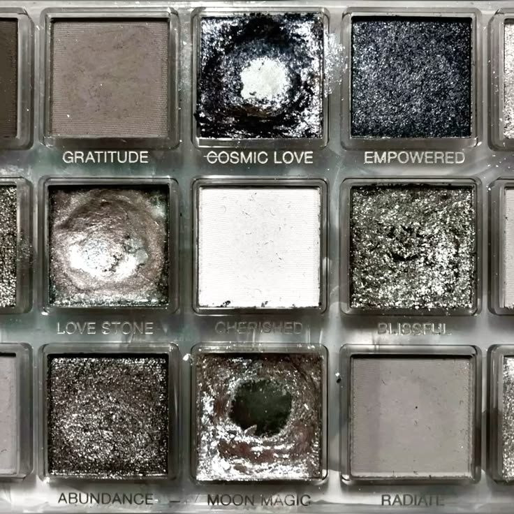 Close-up of woman with sparkling silver glitter eyeshadow makeup